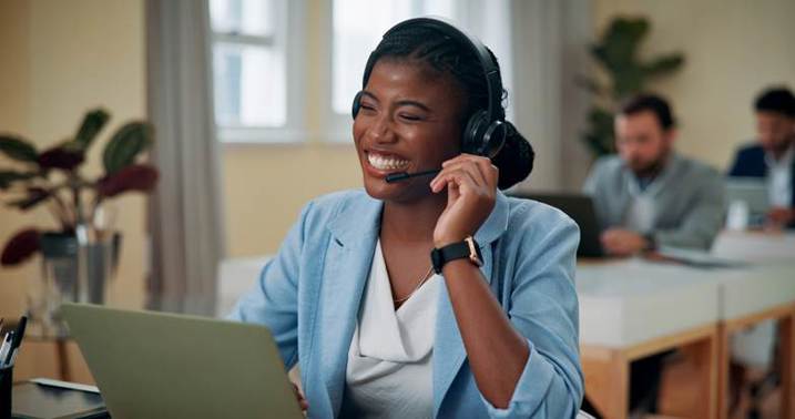 A person wearing a headset and smiling

AI-generated content may be incorrect.